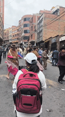 Traditional street parade with dancers and musicians in La Paz