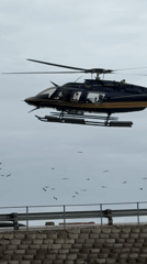 Cape Town helistop buzzing with helicopter traffic on a cloudy morning