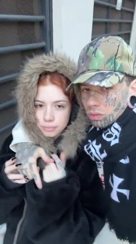 Candid couple moment in Buenos Aires, fur coat and tattoos