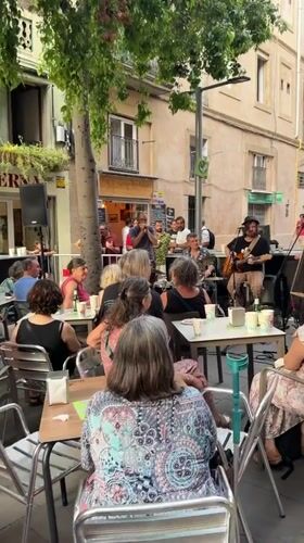 Live music and a lounging dog, one Barcelona evening