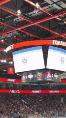 Packed arena, red-clad crowd, live hockey in Sosnovtsy
