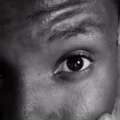 Black and white close-up portraits and scenes from Narayi, Nigeria