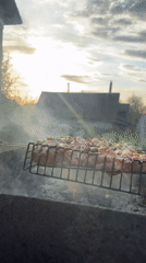Backyard barbecue and traditional meal documented in Chaikovsky, Russia