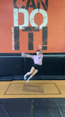 Woman performs acrobatic routine at Krasnoyarsk trampoline park