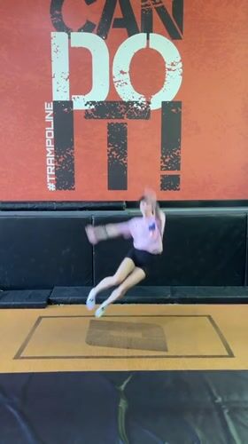 Woman performs acrobatic routine at Krasnoyarsk trampoline park
