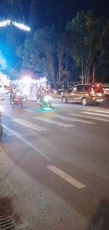 Decorated vehicle parade with motorcycle escort in Da Lat