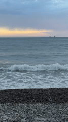 Evening beach moments captured along Montenegro's pebbled coastline