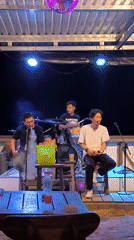 Musical performances observed at beach stage and restaurant venue