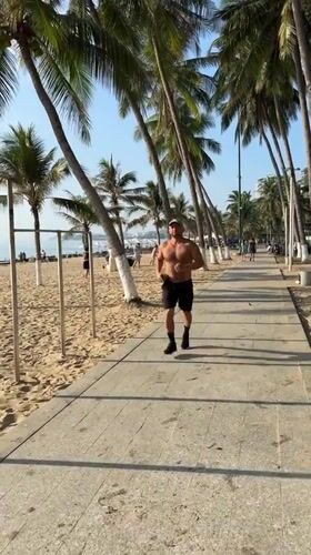 Nha Trang beachfront promenade, evening activity along the palms