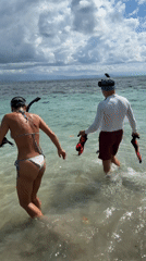 Couple begins early morning snorkeling session off Nusa Penida