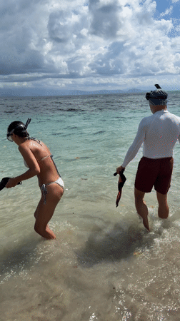 Couple begins early morning snorkeling session off Nusa Penida