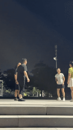 Shuttlecock game in a Zhongtun park on a summer night