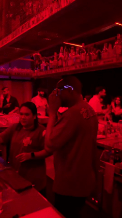 Bar patrons filmed during evening social gathering in Dubai