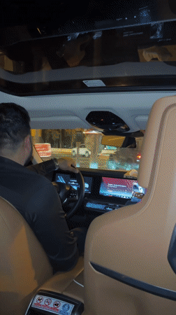 Nighttime car ride documented in Dubai backseat footage