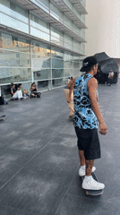 Skateboarding and live street music fill Barcelona's sunny plazas
