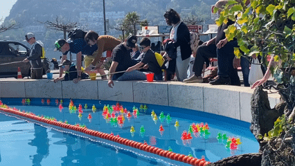 Duck fishing game draws families in Lugano Switzerland