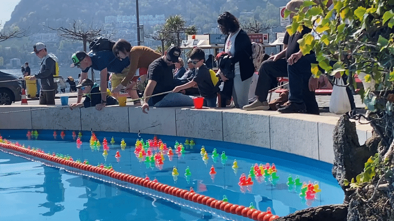 Duck fishing game draws families in Lugano Switzerland