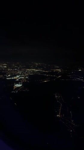 Wizz Air passenger films nighttime aerial view over Sosnowiec