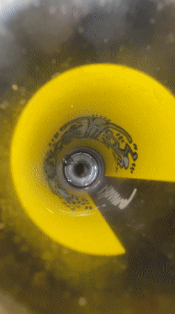 Person recorded using bong in Buenos Aires kitchen