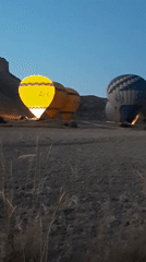 Hot air balloons prepping for dawn launch in Avanos, Cappadocia