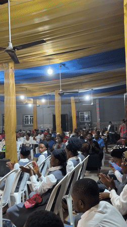 Live music and dancing at a decorated indoor gathering