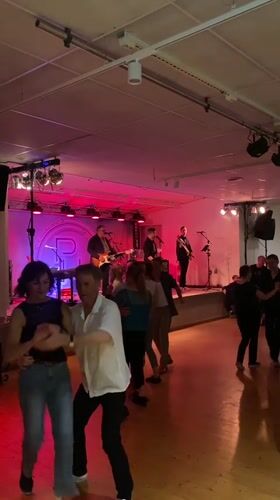 Social gathering with live music documented in Uppsala venue