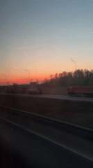 Sunset highway traffic captured on video near Belyi Rast, Russia