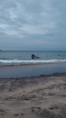 Boat rowing at dusk on Shastrawela beach, Sri Lanka