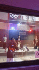 Dance crew rehearses on a lit stage in Pampatar, Venezuela