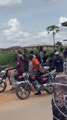 Motorcycle group gathers on roadside in Abakaliki, Nigeria