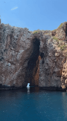 Tourist boat explores sea caves along Turkish Mediterranean coast