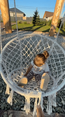 Macrame swing at dusk, playground in Kempelevo, Russia