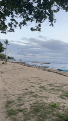 Morning beach life documented in Denpasar, Indonesia