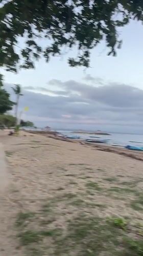 Morning beach life documented in Denpasar, Indonesia