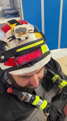 Worker in decorated hard hat spotted smiling in Brest