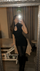 Woman takes mirror selfies at Moscow venue with stage