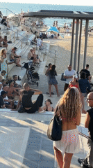 Afternoon hangout on Tel Aviv's tiered waterfront steps