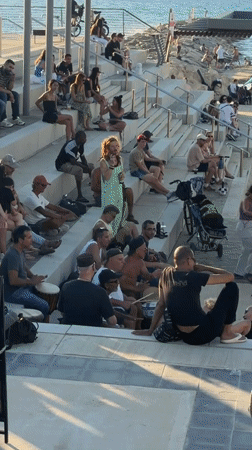 Afternoon hangout on Tel Aviv's tiered waterfront steps
