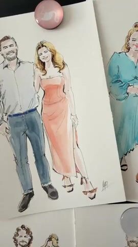 The video shows a close-up of four watercolor paintings of couples, attached to a white surface with magnets. The paintings depict stylishly dressed couples, with details in clothing and facial features. Each painting captures a different couple in different outfits and poses. The backgrounds of the paintings are plain white. The scene appears to be indoors.  The lighting is bright and even.