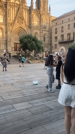 Bubble performer and Gothic Quarter streets, Barcelona afternoon