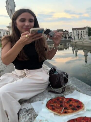 Pizza, movement, and golden hour in a Padua piazza