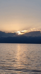 Sunset observed over calm waters in Italy