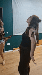 Woman dancing indoors captured in Chaikovsky, Russia