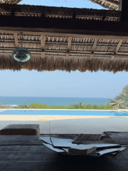 Beachside cabana scene captured in Mexico with ocean views