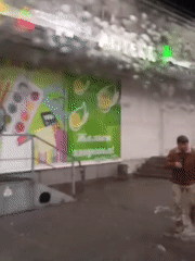 Rainy street scenes captured from moving vehicles in Russian city