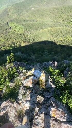 Hiker explores rocky cliffs near Bilka, Bulgaria