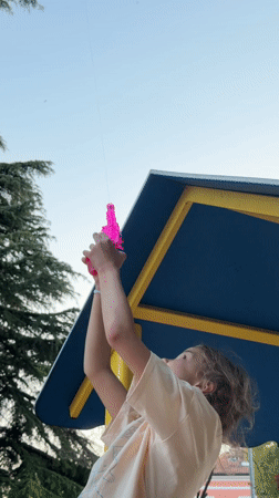 Children play with water guns at Rijeka playground