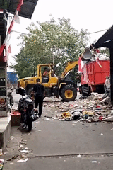 West Jakarta neighborhood: trash cleanup and everyday street life