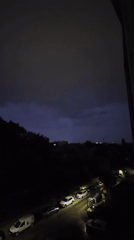 Summer night in Plovdiv, faint lightning glow over the city