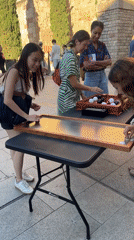 Street performers entertain cafe crowds in Barcelona's Born district